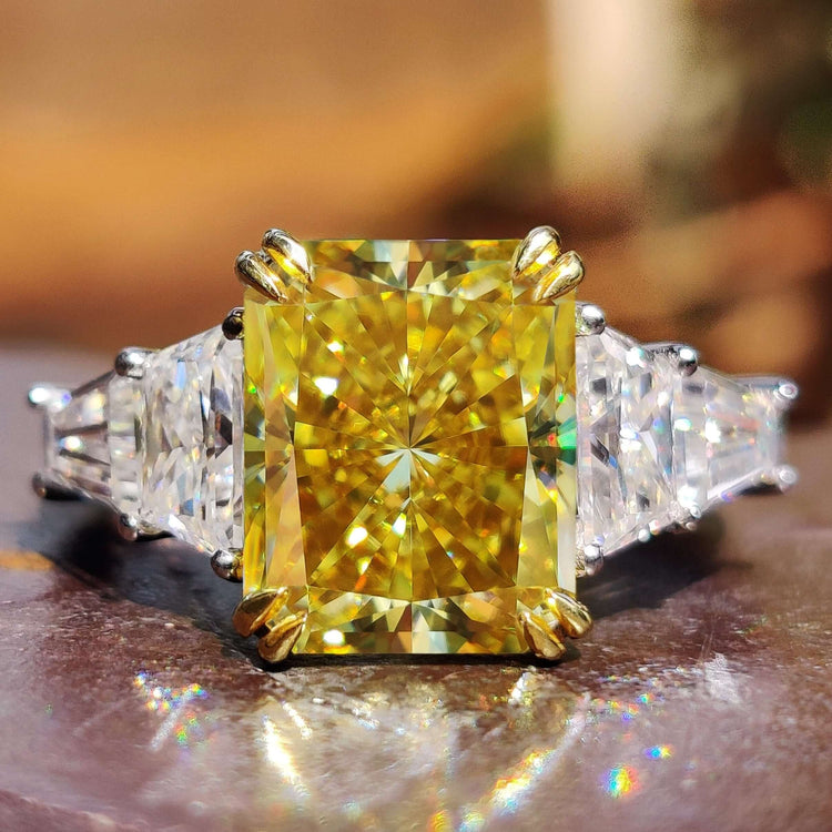 5 stone engagement ring with radiant cut center moissanite.