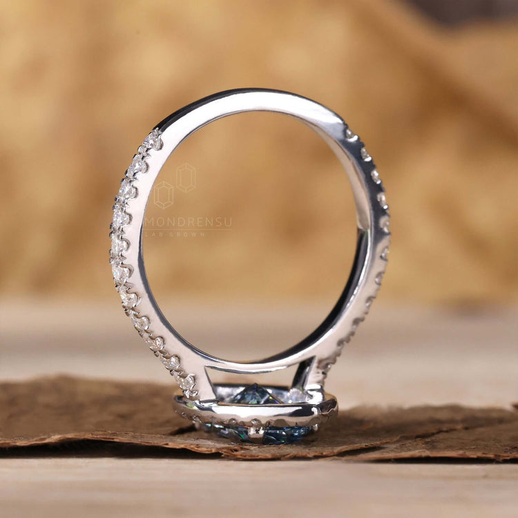 Marquise ring designed with a marquis diamond and claw prong setting.