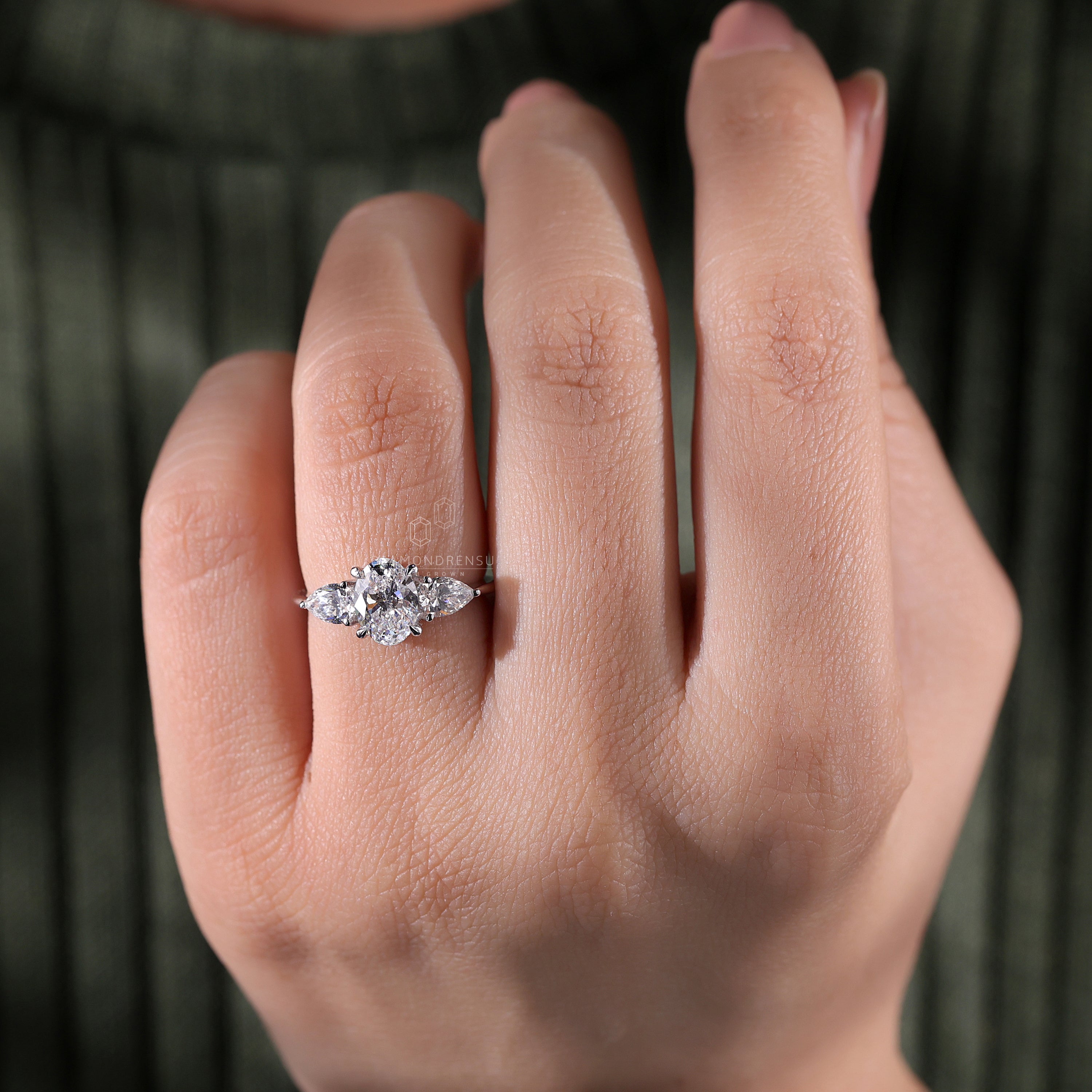 White gold oval diamond ring with timeless appeal.