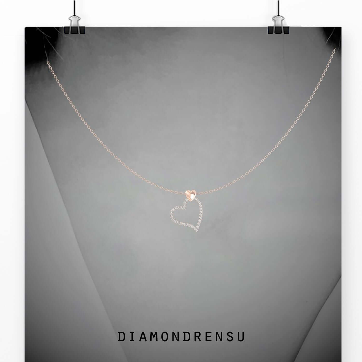 Heart shaped pendant crafted in rose gold with lab grown diamond.