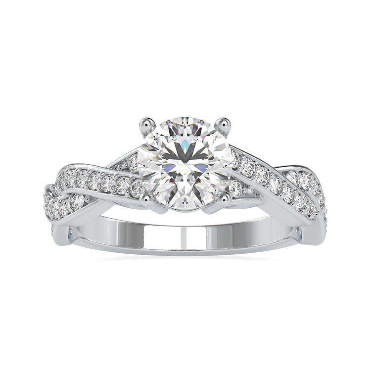 Simple diamond ring with four prong setting and twisted band.