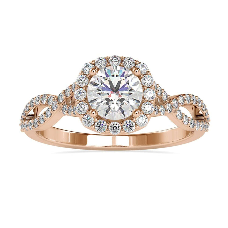 Diamond twist engagement ring with round cut centre stone in rose gold.