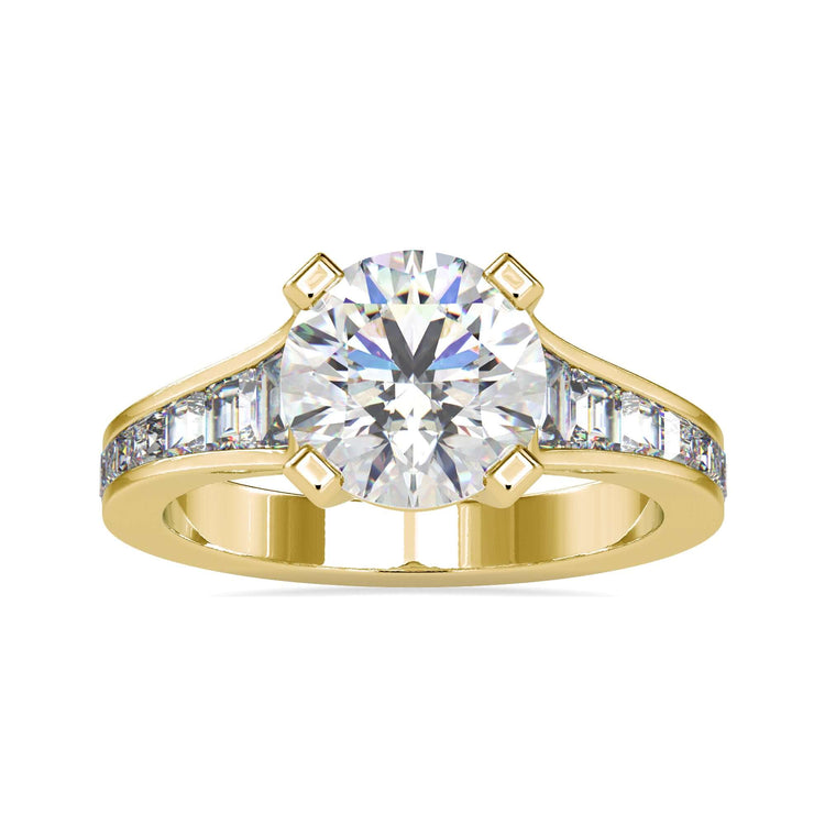 Tab prong ring with round cut diamond in yellow gold.