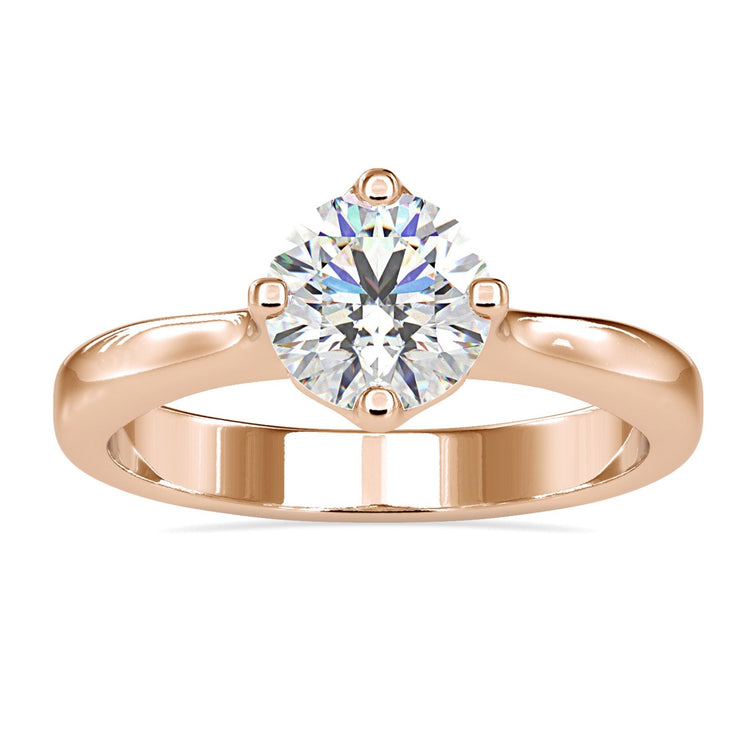 Round cut engagement ring with solitaire setting, handmade in UK.