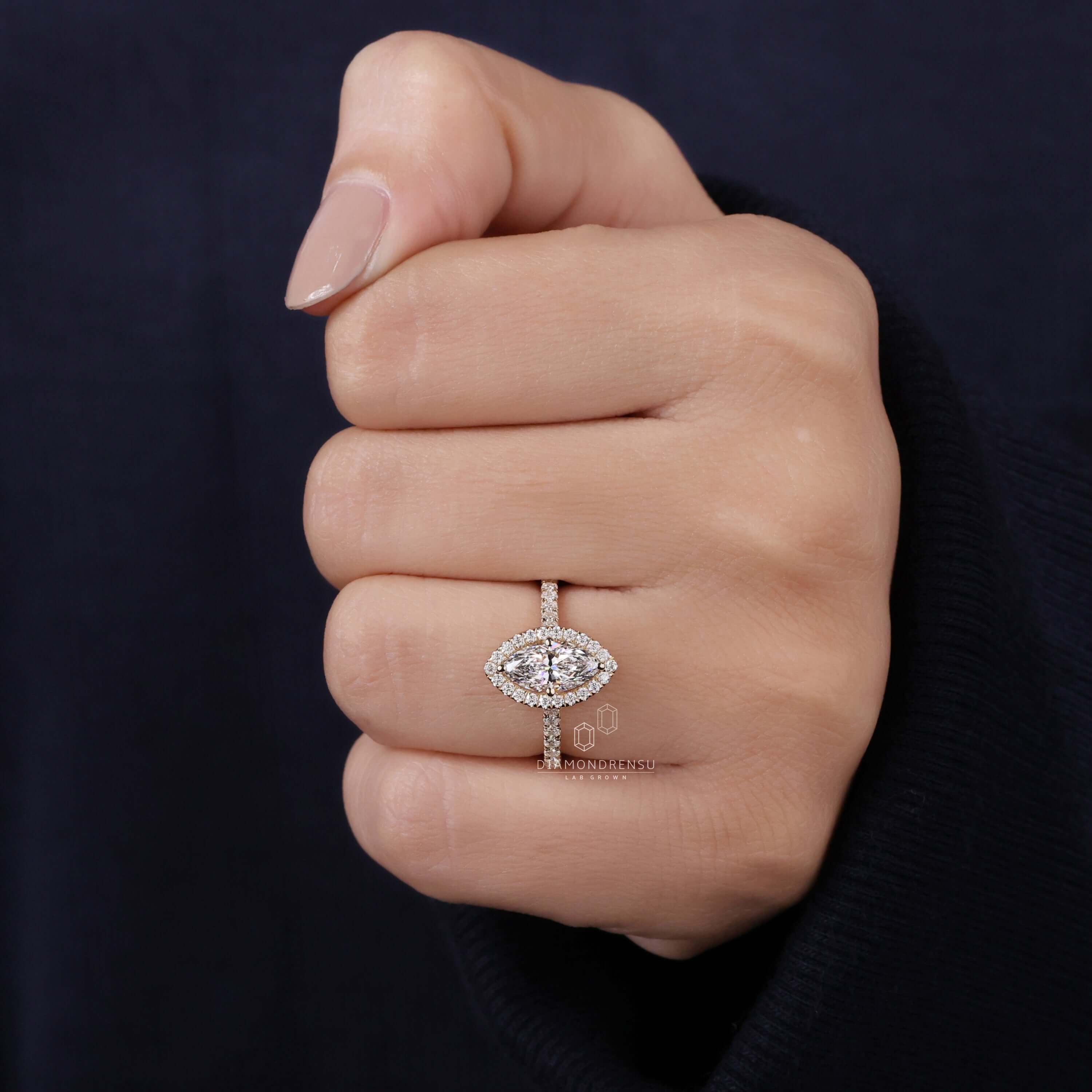 Marquise diamond engagement ring featuring a 4 prong setting