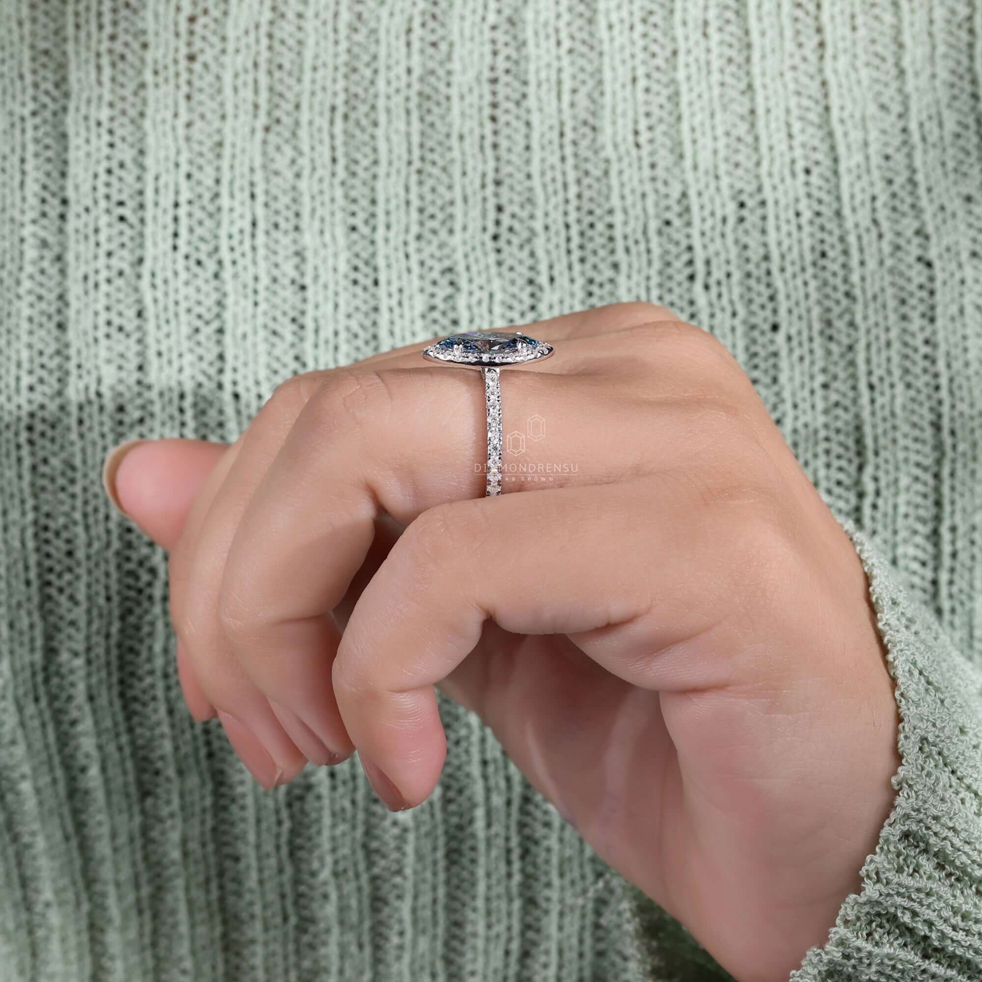Marquis diamond paired with a 4 prong claw setting for secure brilliance.