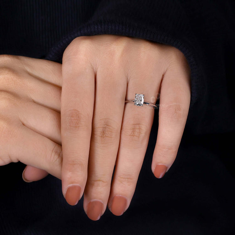 4 prong engagement ring with elongated cushion diamond, perfect for UK engagement ring seekers.