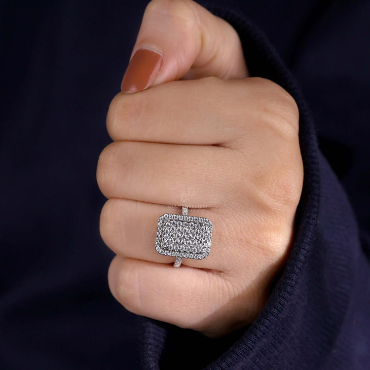 UK engagement ring with pave setting and a handmade ring featuring a unique radiant diamond halo.