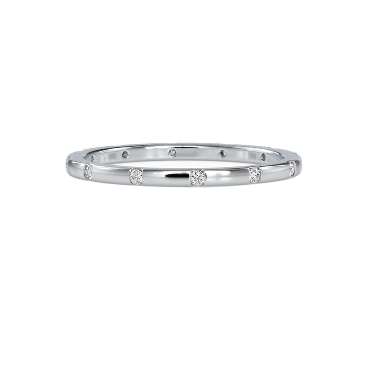 Round cut diamond wedding band in rose gold finish.