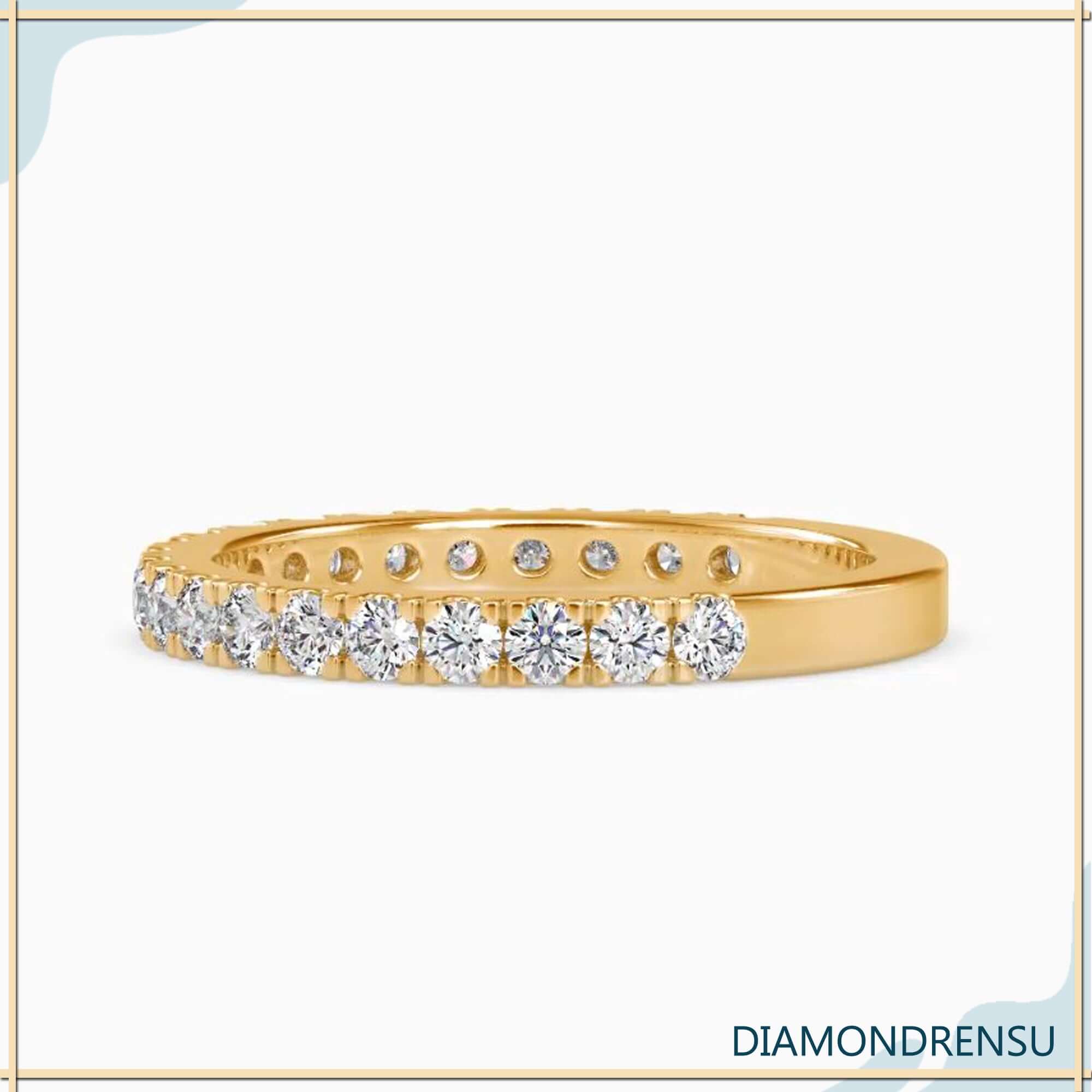 Round cut diamond band crafted in gold with 3/4 setting.