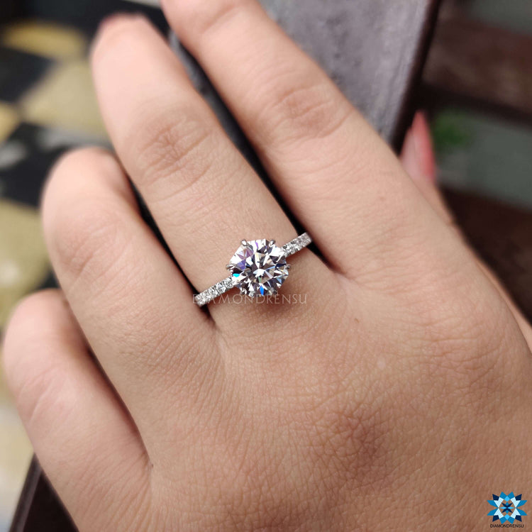 Diamondrensu UK octagon moissanite engagement ring.