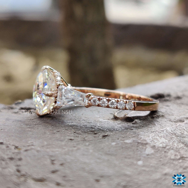 Rose gold ring featuring Octavia cut center moissanite.