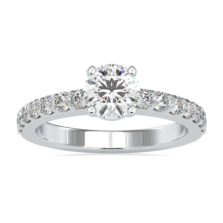 Diamond pave ring with round cut centre in white gold.