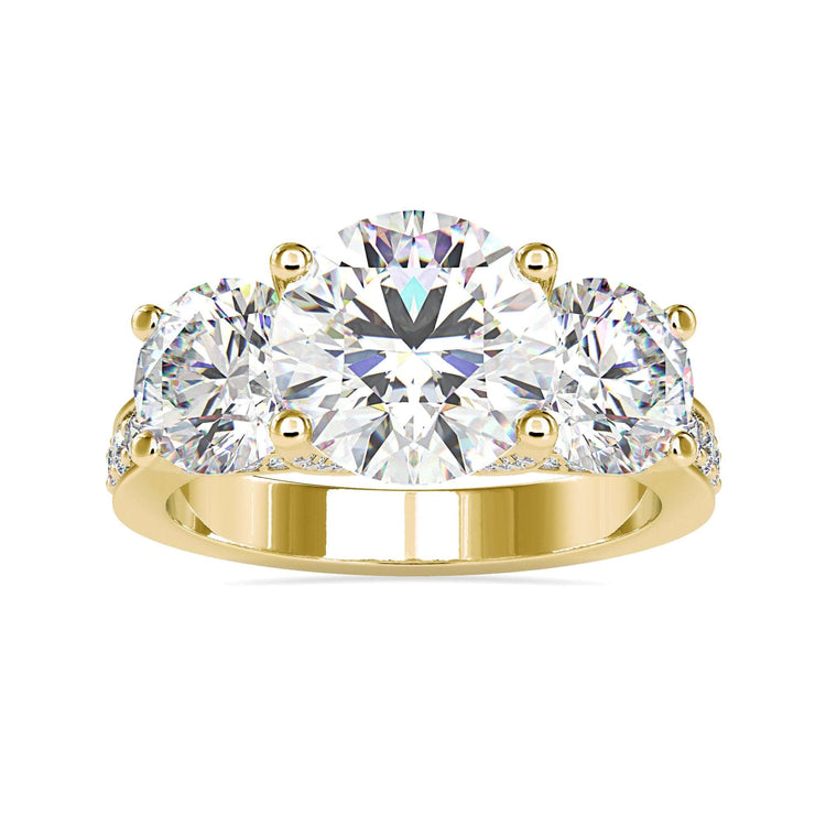 Custom design ring with side diamonds and round centre.