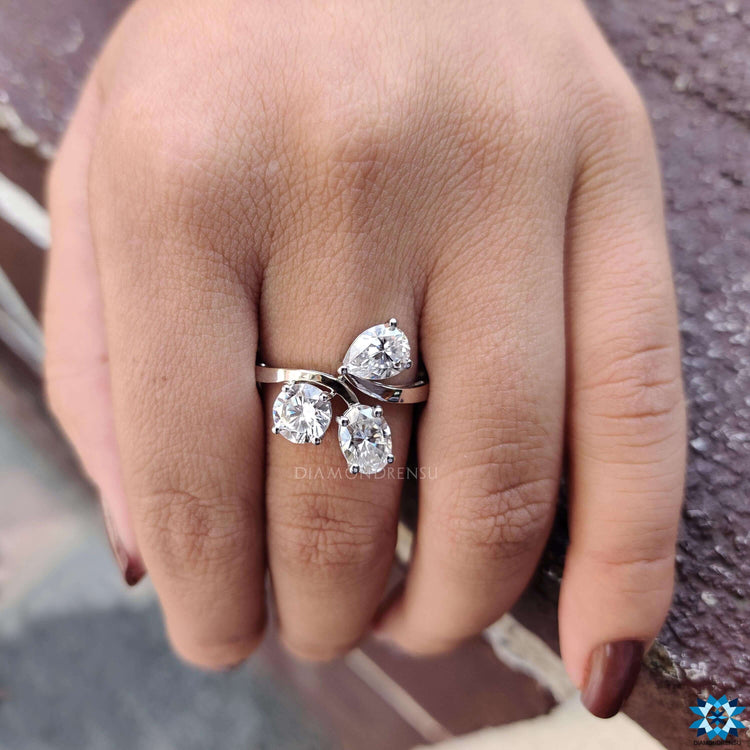 Buy moissanite ring with mixed stone shapes.