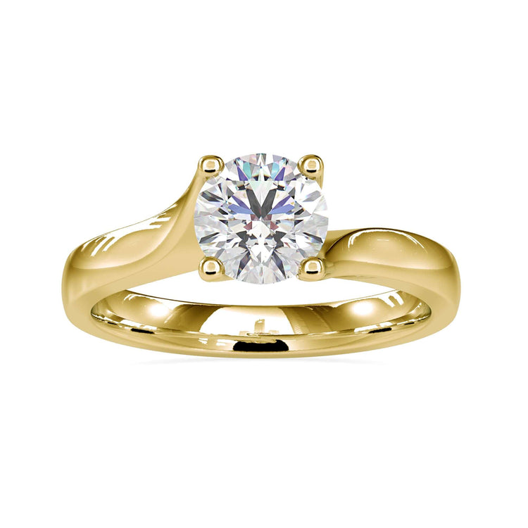 UK engagement ring with bypass style and four prongs.