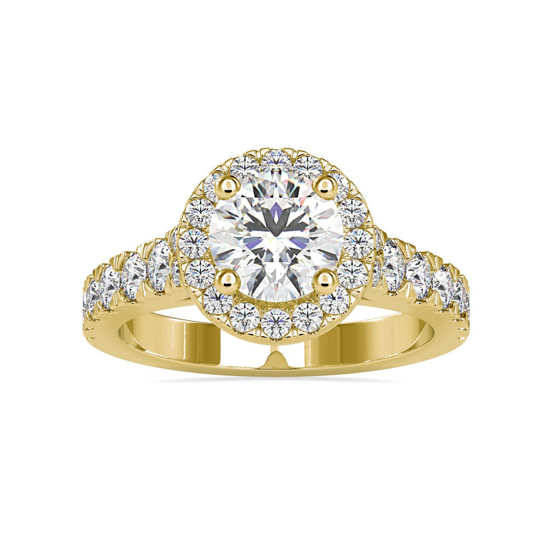 Simple diamond ring with round cut and pave accents.