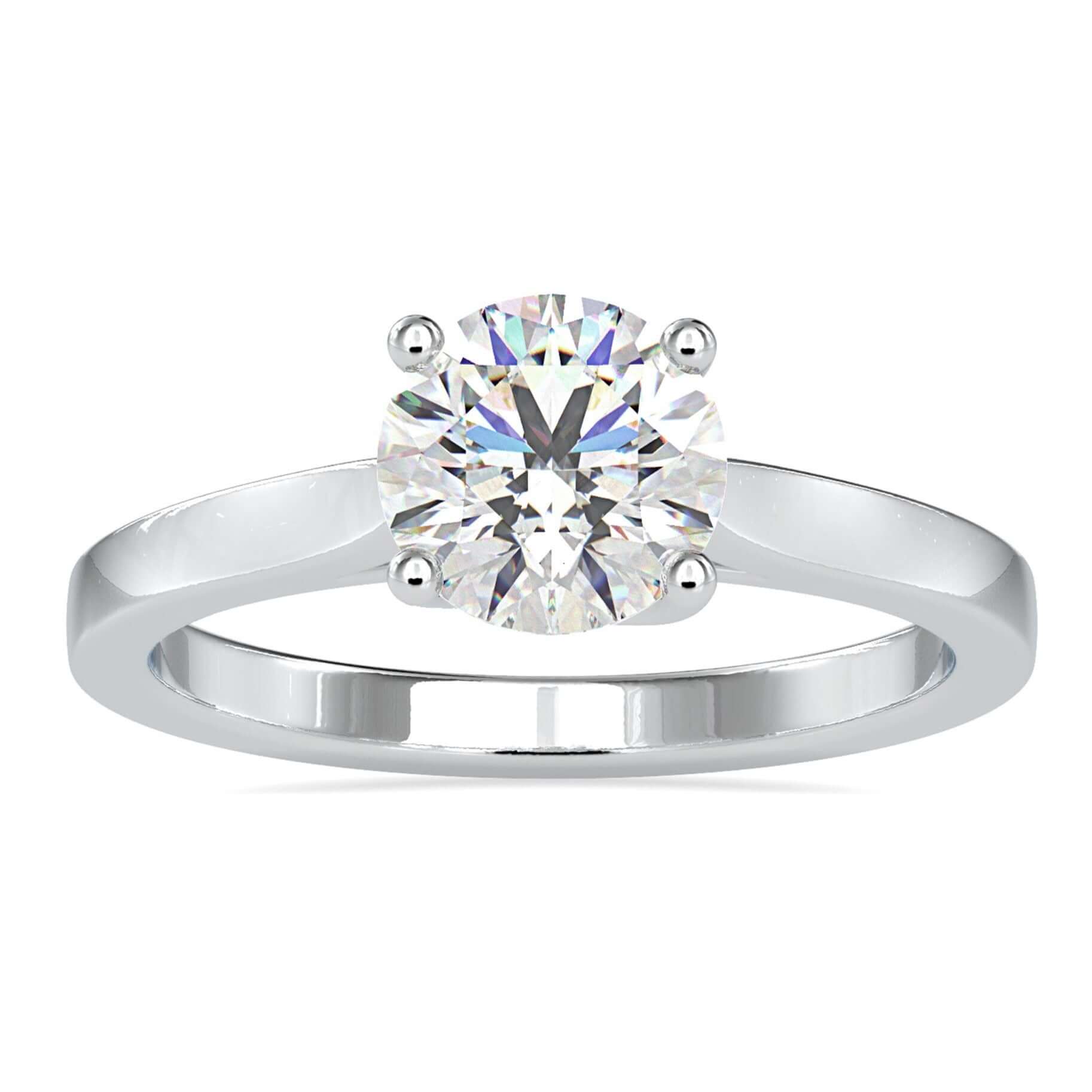 Solitaire round diamond ring with 4 prong setting, handmade in UK.