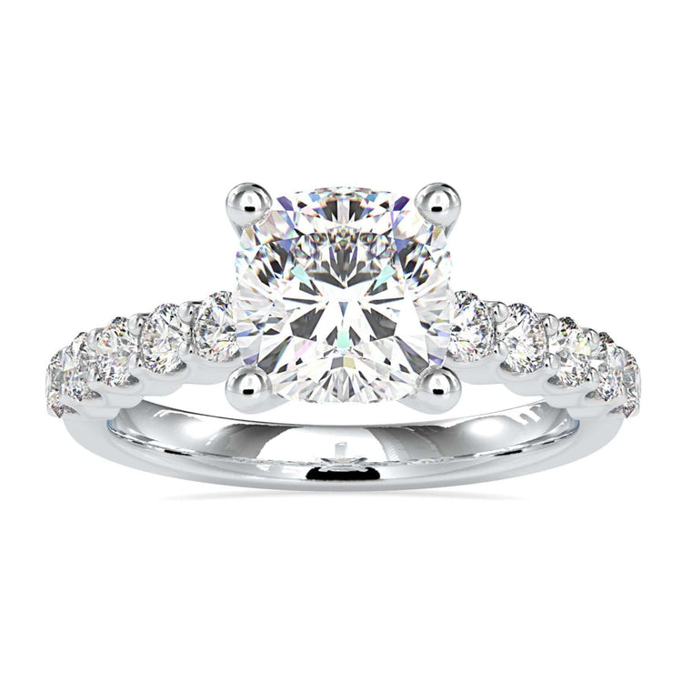 Cushion cut engagement ring with white gold 4 prong setting.