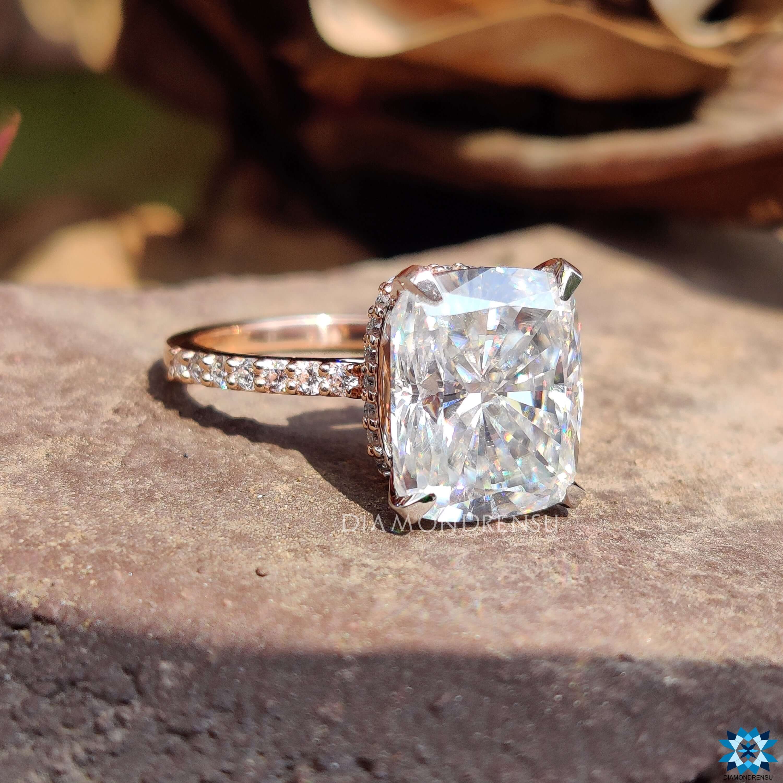 Diamondrensu UK two-tone cushion cut engagement ring.