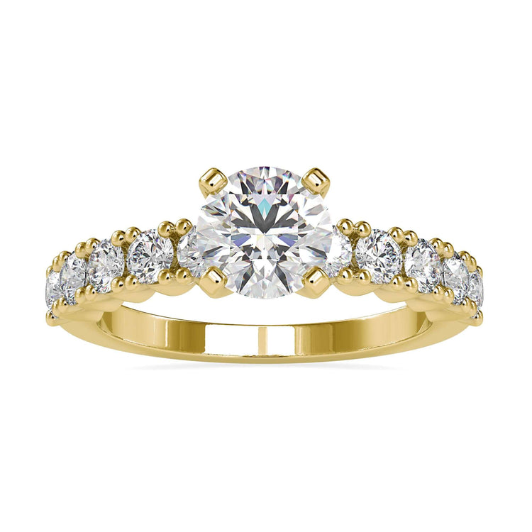Pave band engagement ring with round cut diamond and four prong setting.