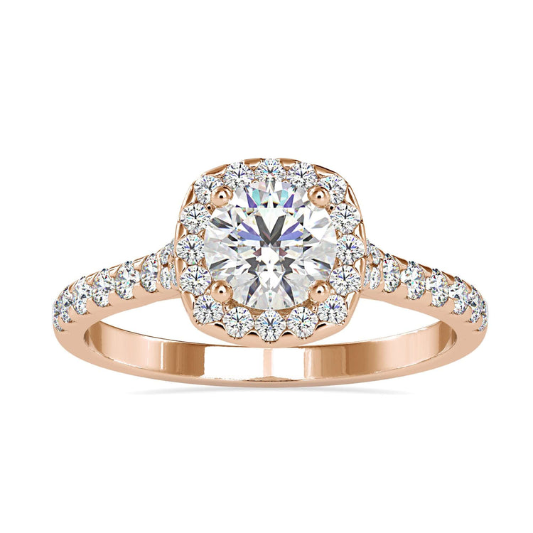 Round prong setting halo ring in rose gold.