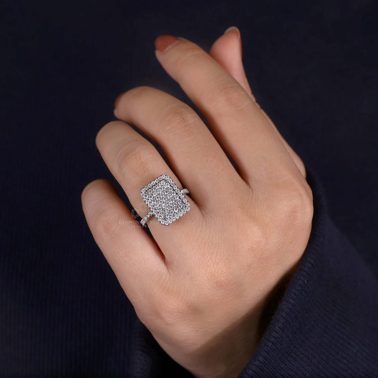 Radiant outline ring with pave diamond accents and a halo ring setting, perfect as a unique engagement ring.