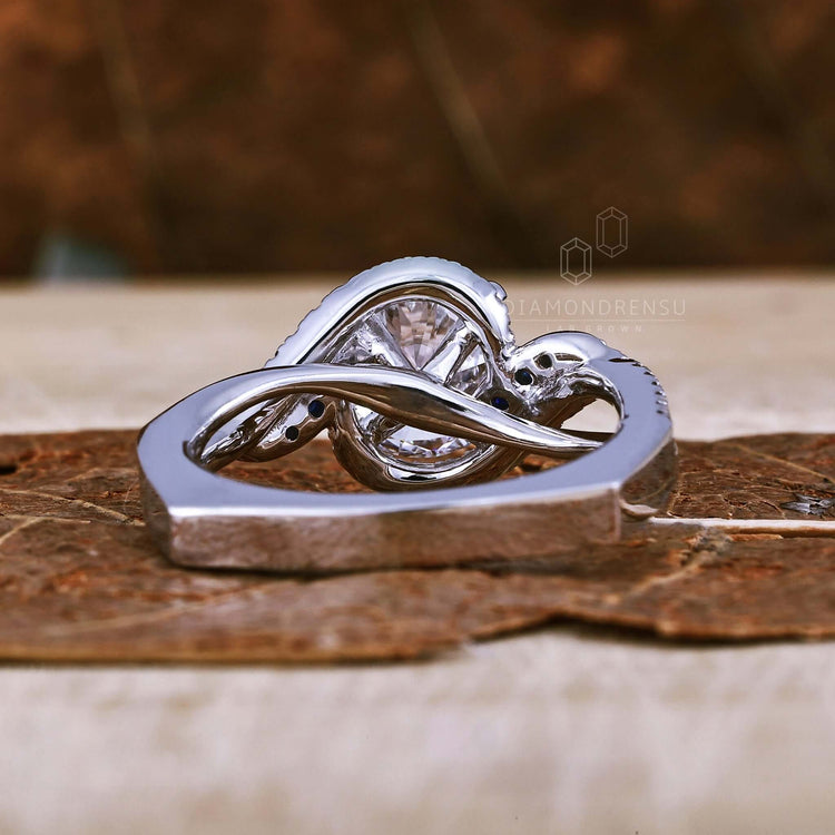 Bypass ring with pave diamond accents for a modern engagement ring.