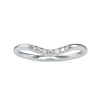 Curved wedding band crafted with round cut diamonds.