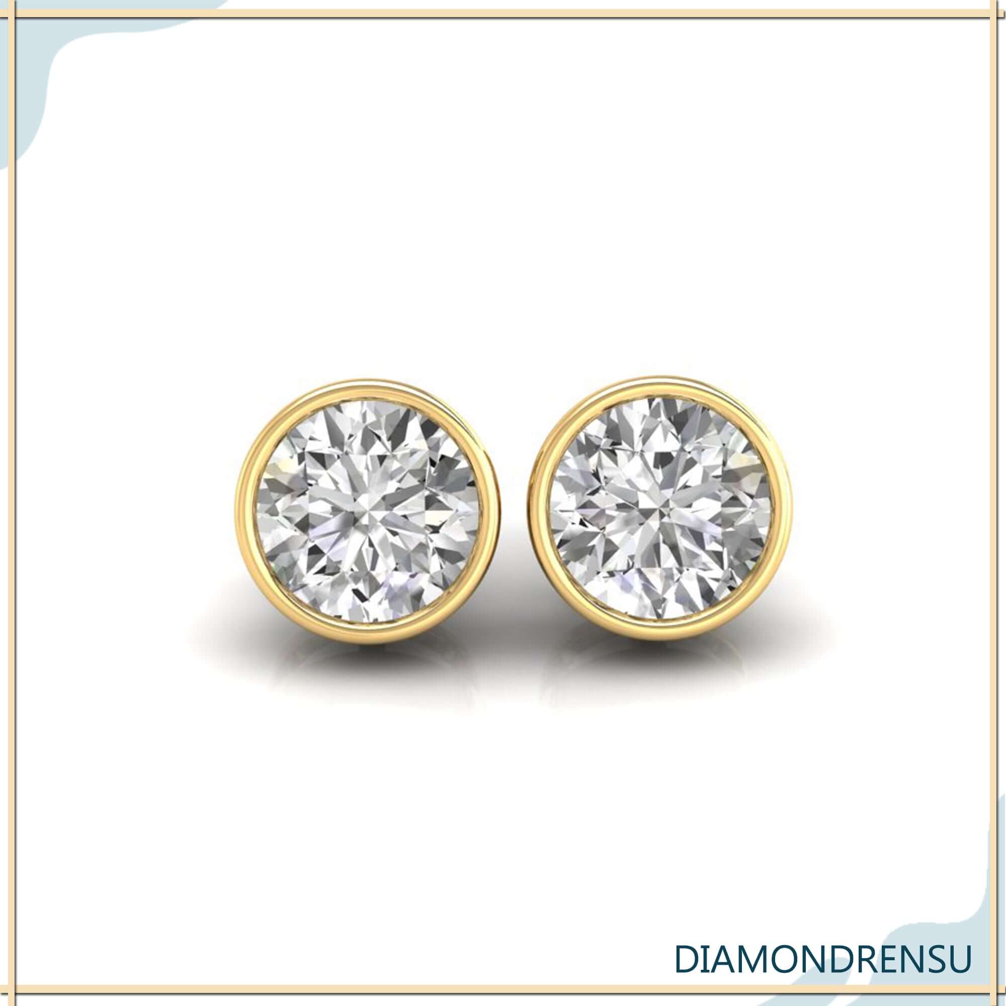 White gold bezel stud earrings for everyday wear.