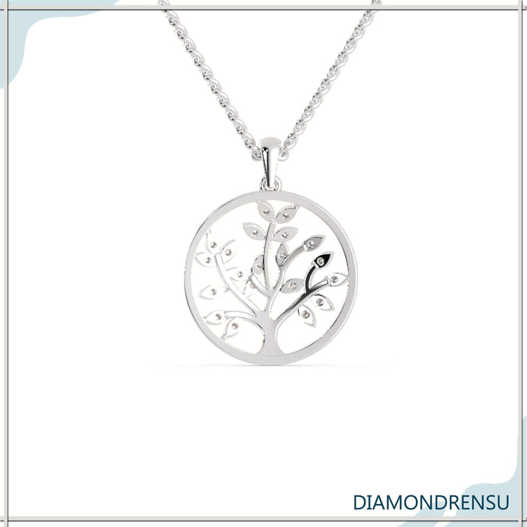 Unique diamond pendant shaped like a tree of life charm.