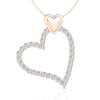 Heart shape pendant with round diamond in shared prong setting.