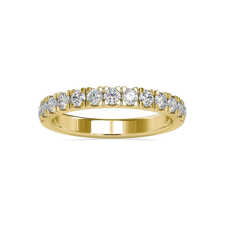 Rose gold wedding band featuring handmade details.