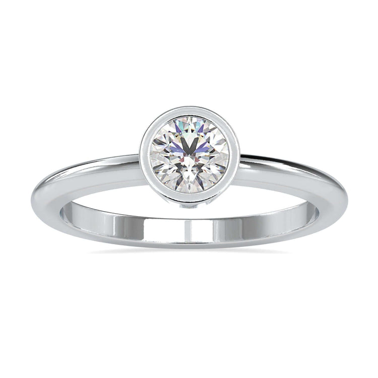 Bezel set engagement ring with round cut lab grown diamond.