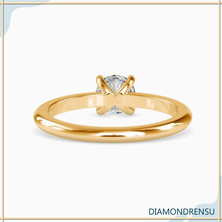 Handmade jewellery piece with gold solitaire and prong setting.