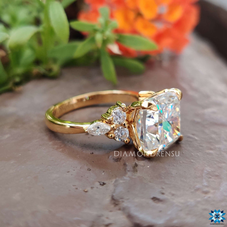 Handmade jewellery ring with custom moissanite design in elegant yellow gold.