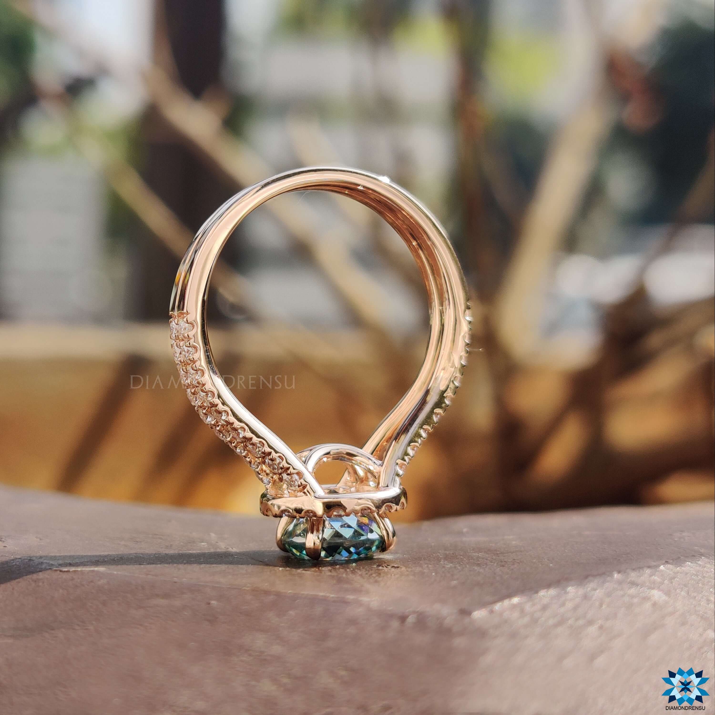 Halo engagement ring with Portuguese cut.