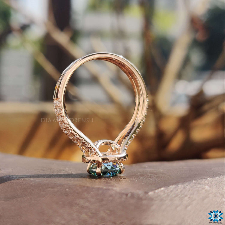 Halo engagement ring with Portuguese cut.