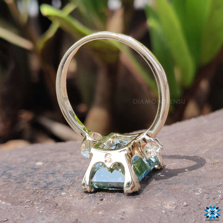 Custom engagement ring with radiant and round moissanite.