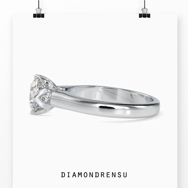 Buy engagement ring in UK with tulip setting and white gold.