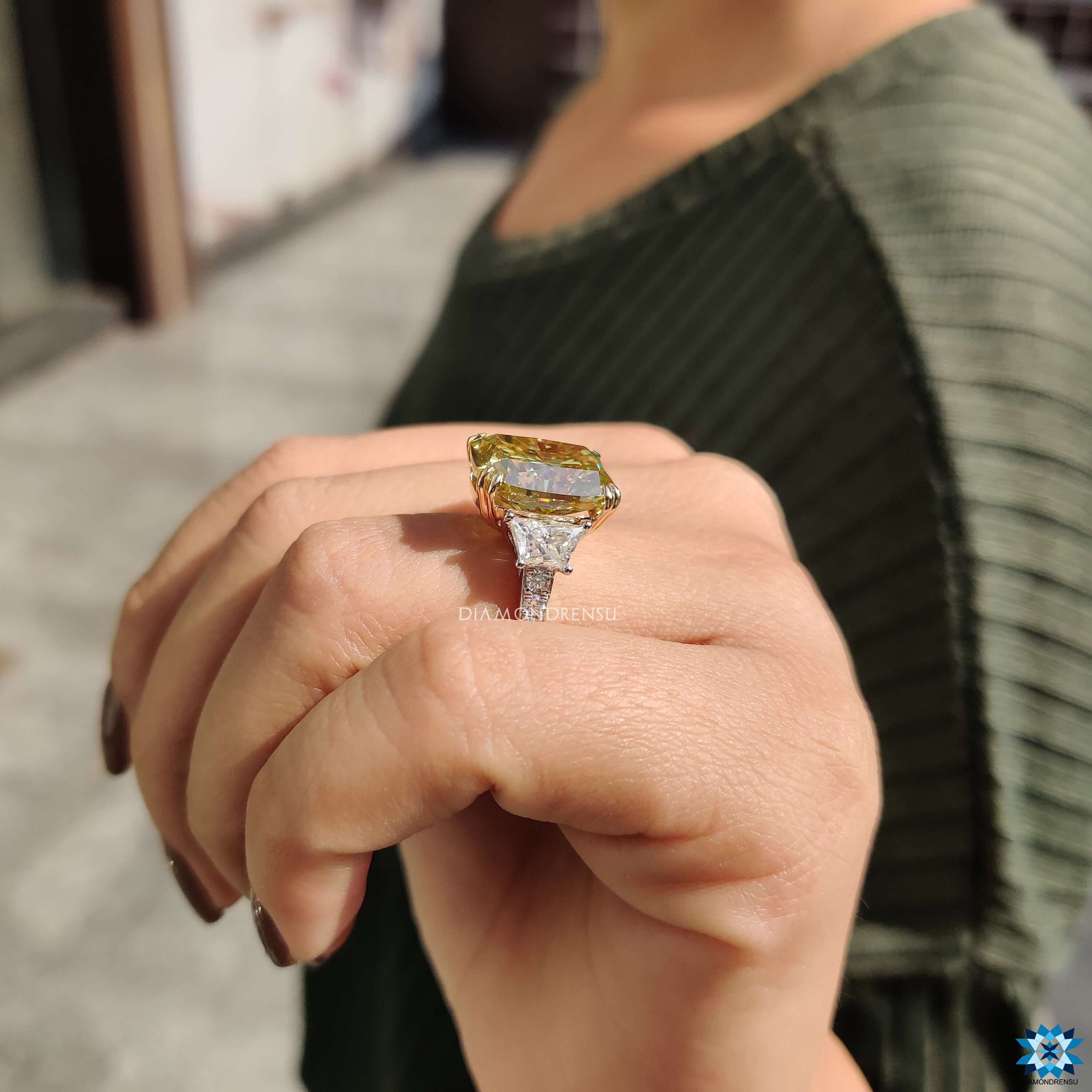 Custom engagement ring with canary yellow center stone.