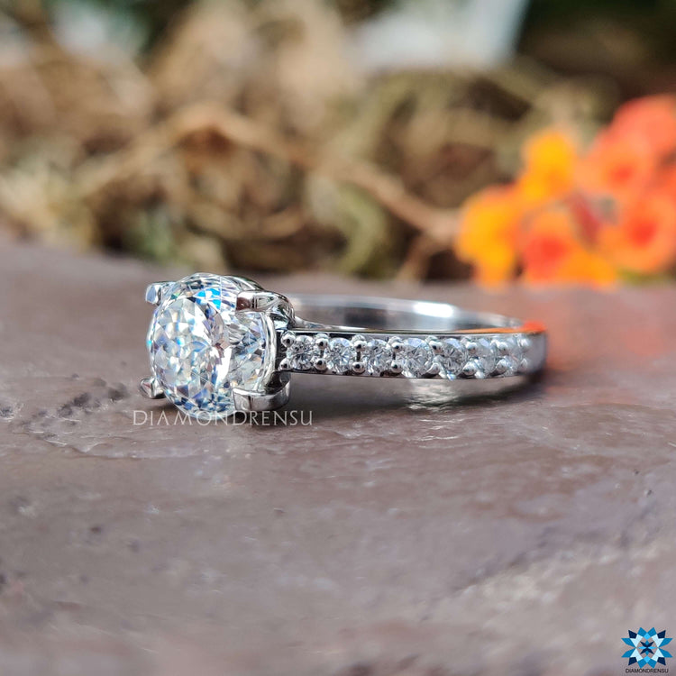 Pave setting engagement ring with four prong mount.