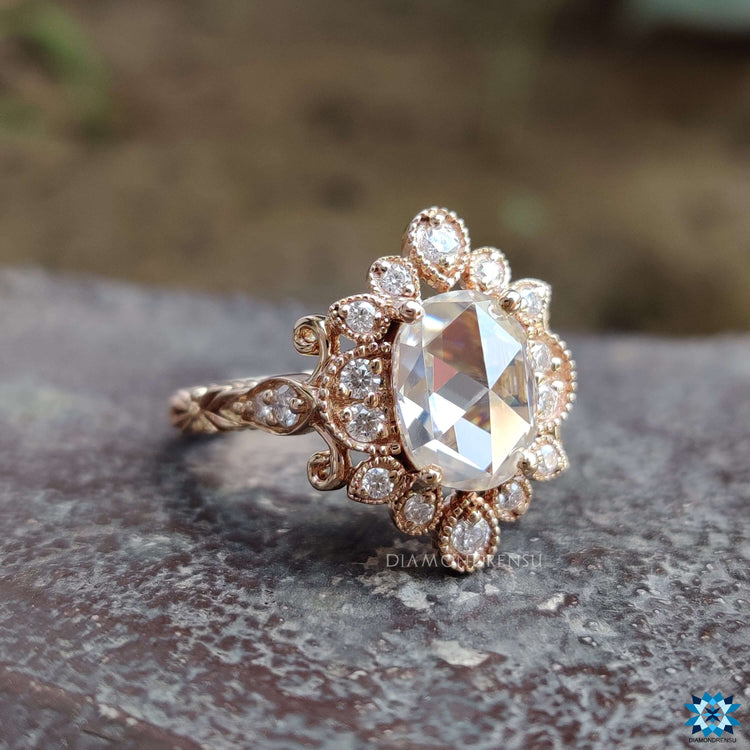 Peekaboo blue moissanite in rose gold engagement ring.