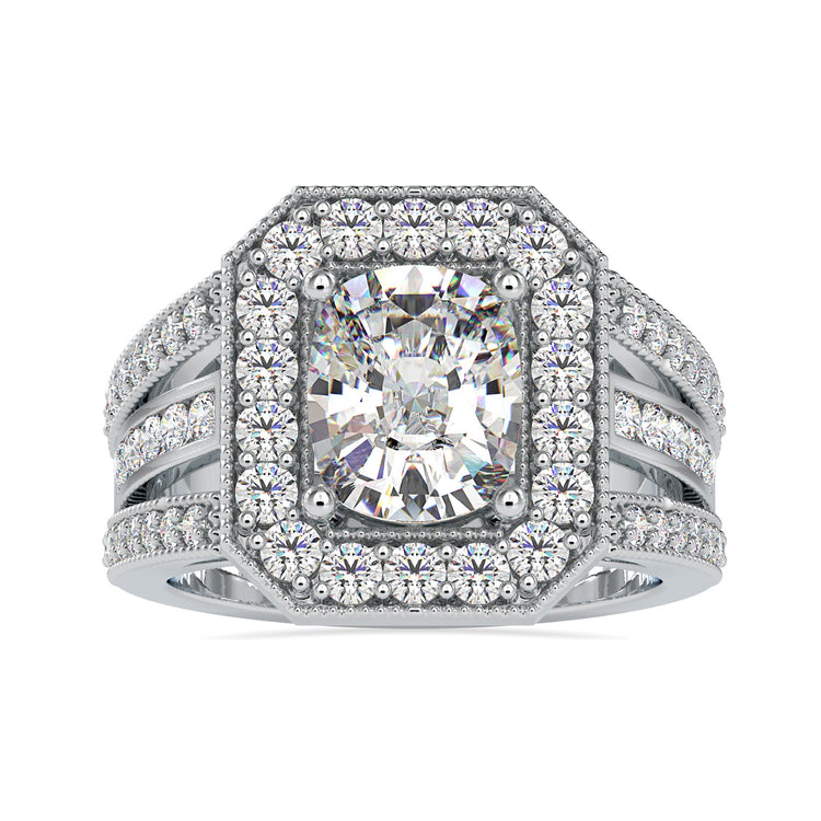 UK engagement ring with halo setting and cushion cut diamond.