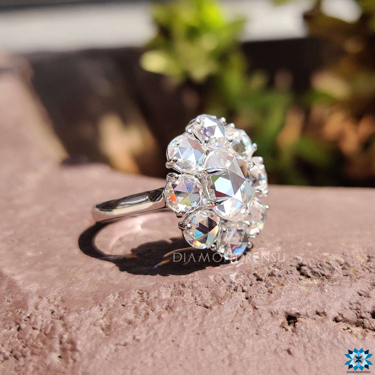 Custom engagement ring with floral halo and rose cut gem.
