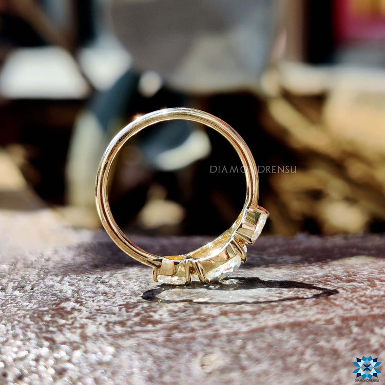 Custom yellow gold engagement ring with rose cut center.