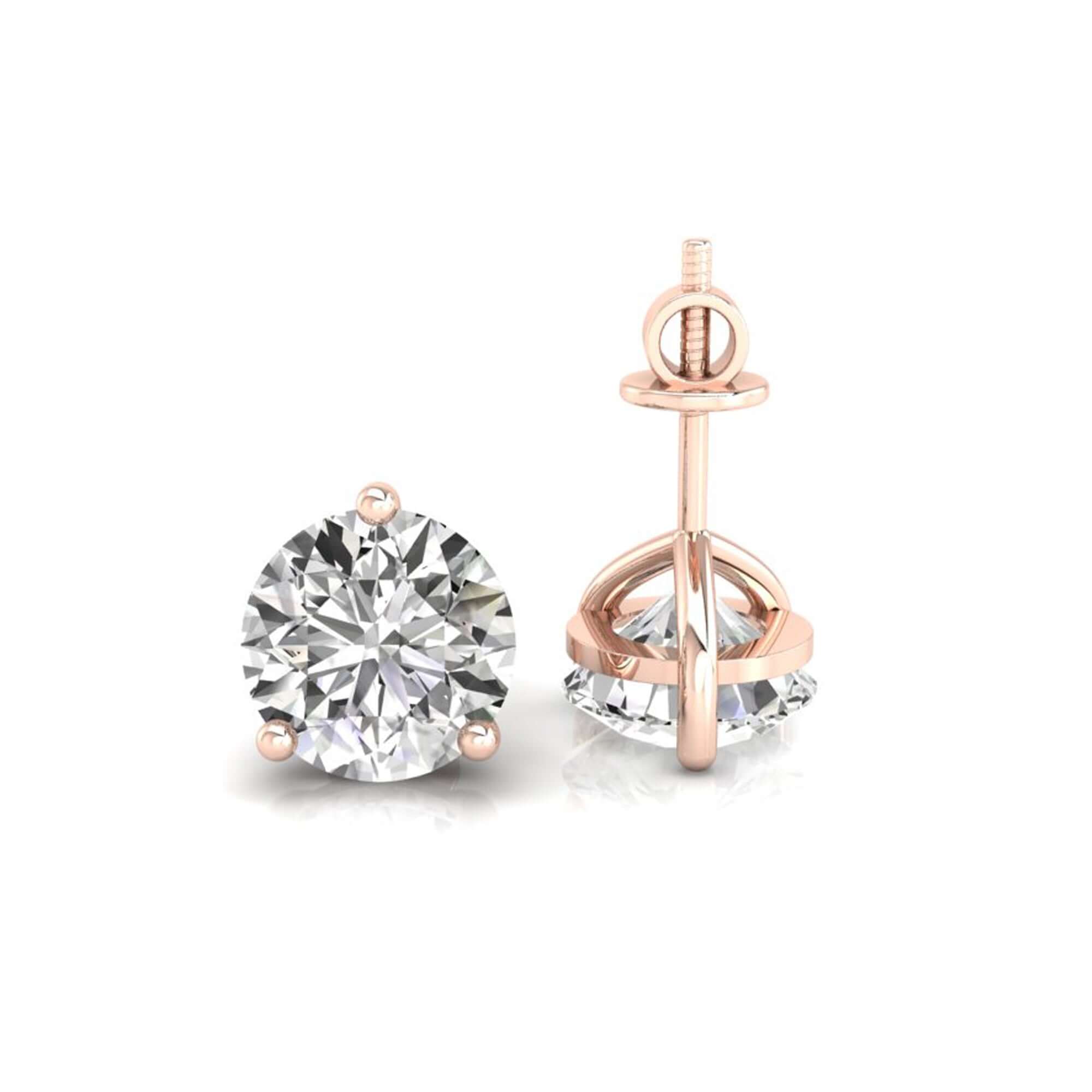White gold stud earrings with clean 3 prong design.