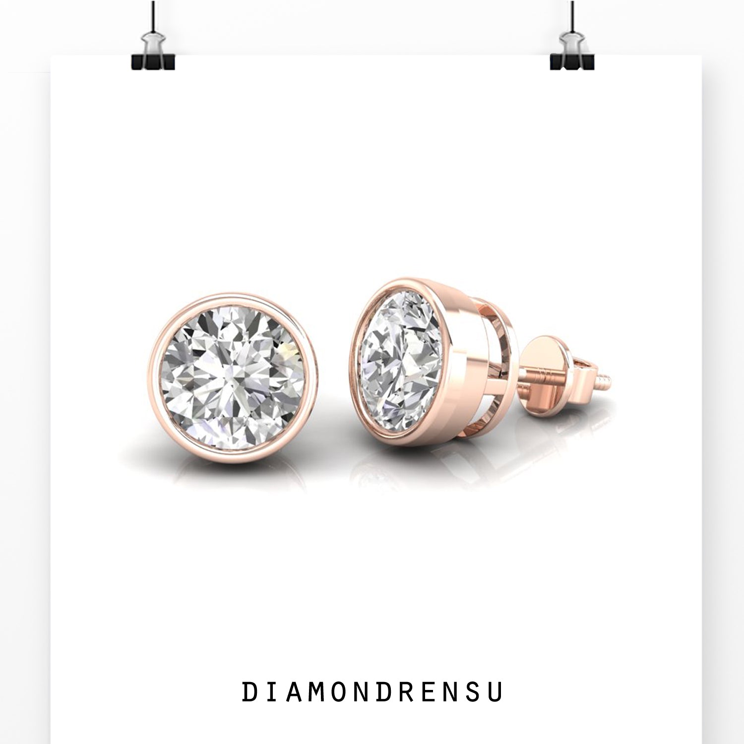 UK diamond earrings featuring round bezel set diamonds in white gold.