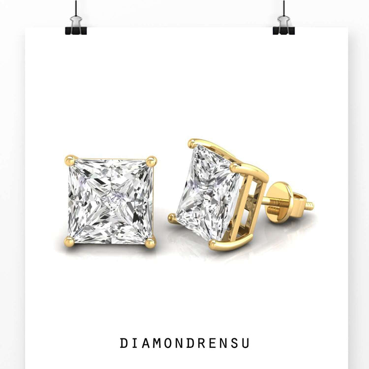 UK diamond earrings featuring princess cut diamonds in gold studs.
