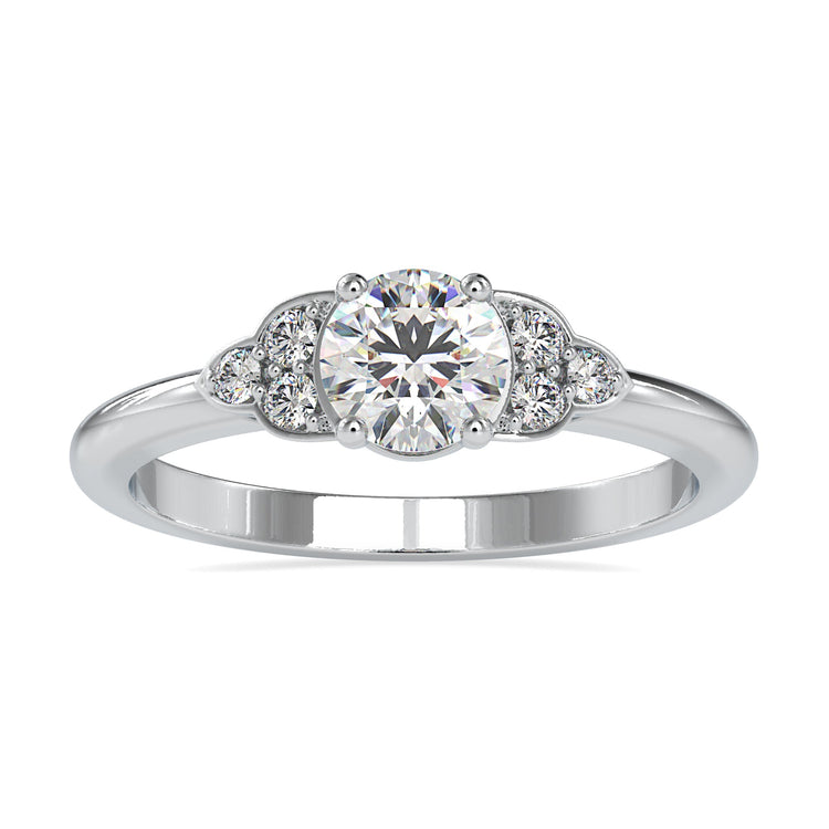 7 stone diamond ring with round cut diamonds in white gold.